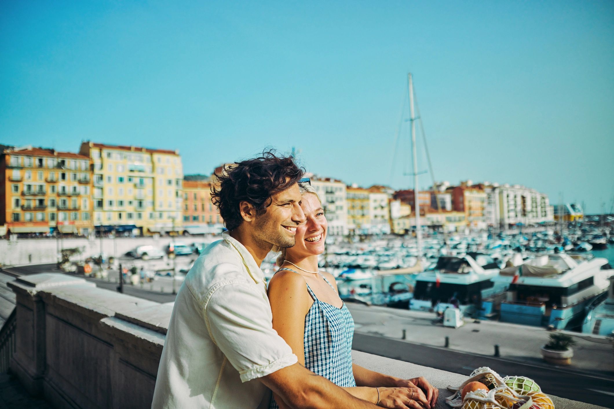 Couple enjoying a coastal city view